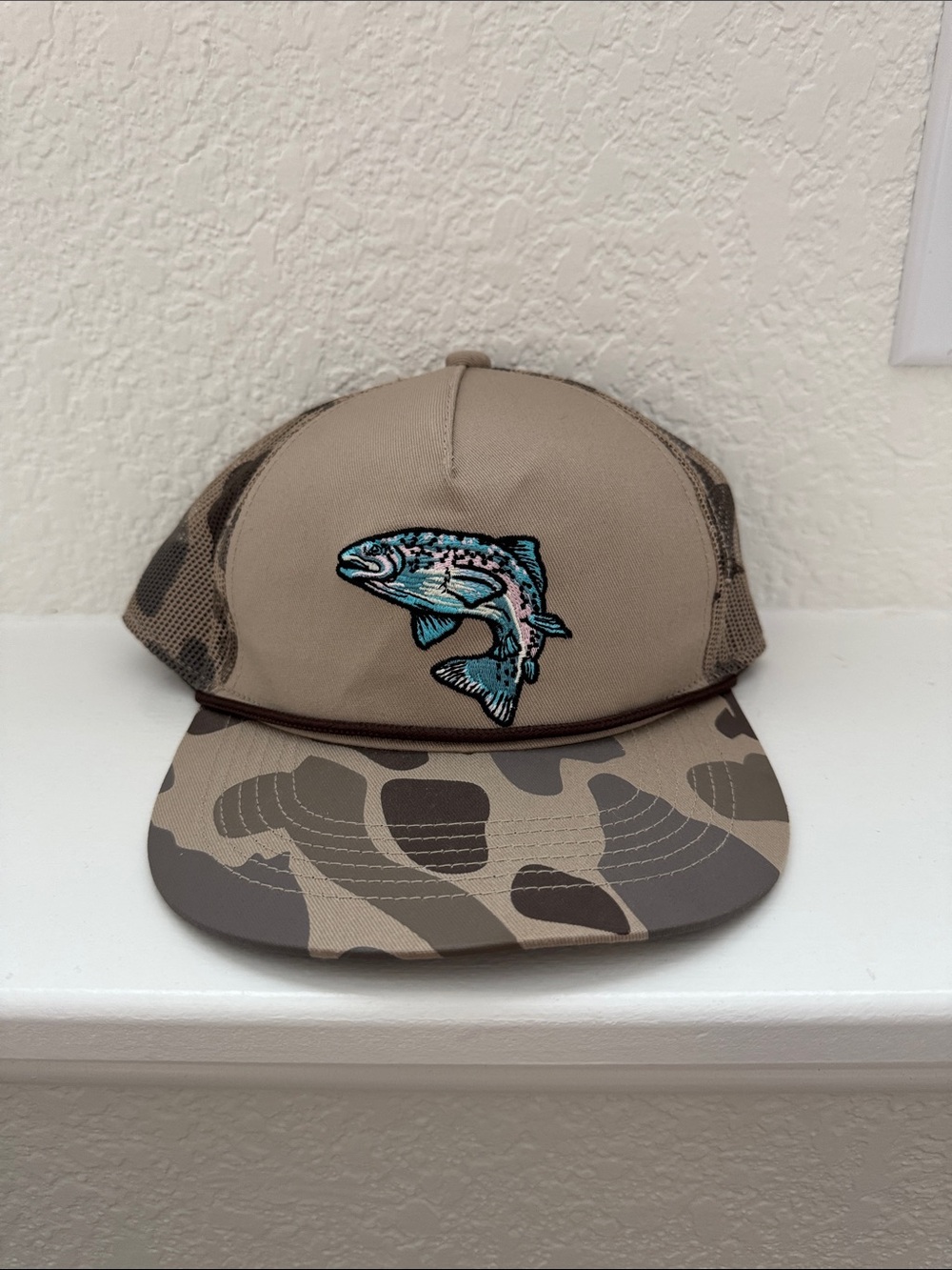 Beige Camo Fishing Trucker Hat with Blue Fish Patch